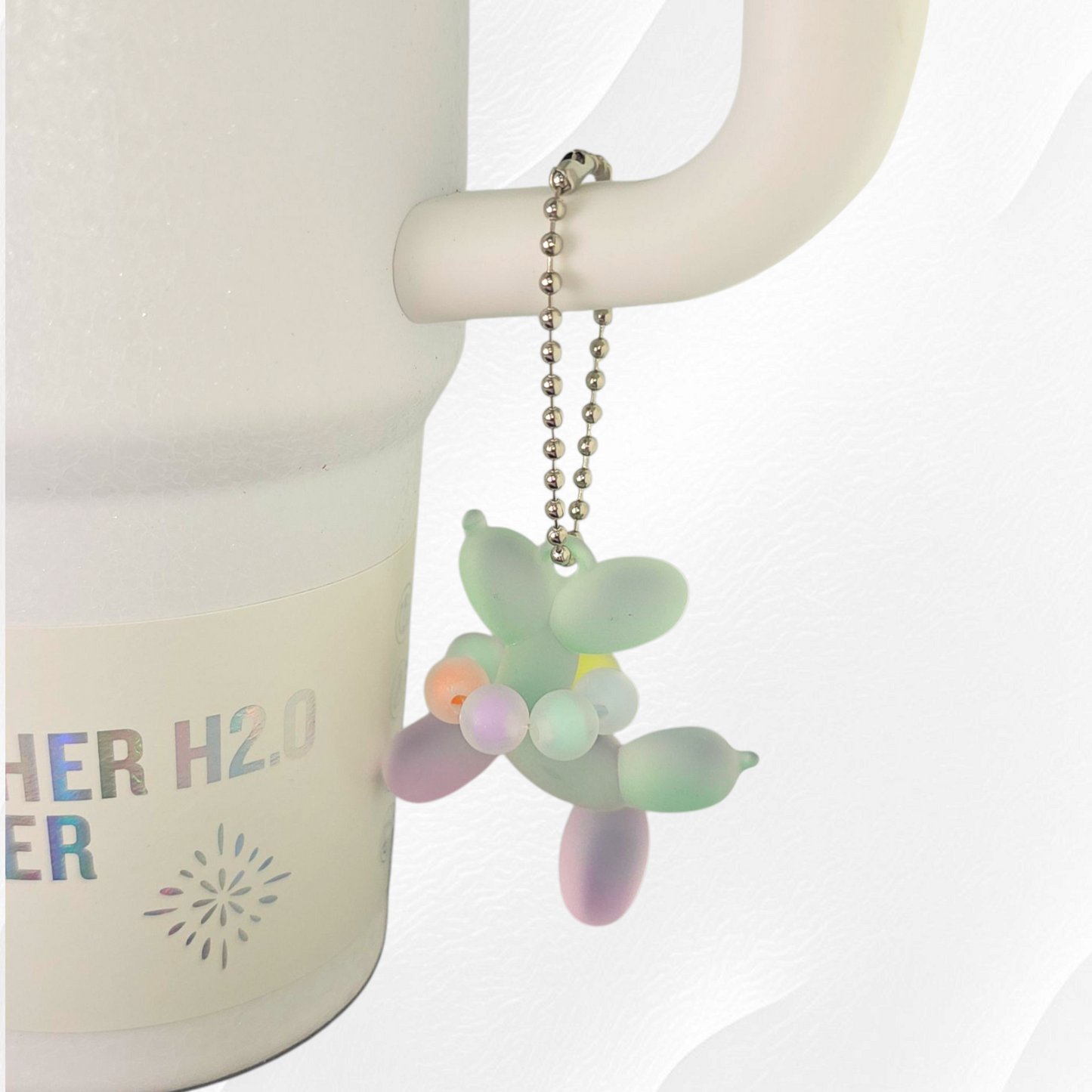 Purple & Green Ombre Balloon Dog wearing a beaded necklace tumbler charm. 