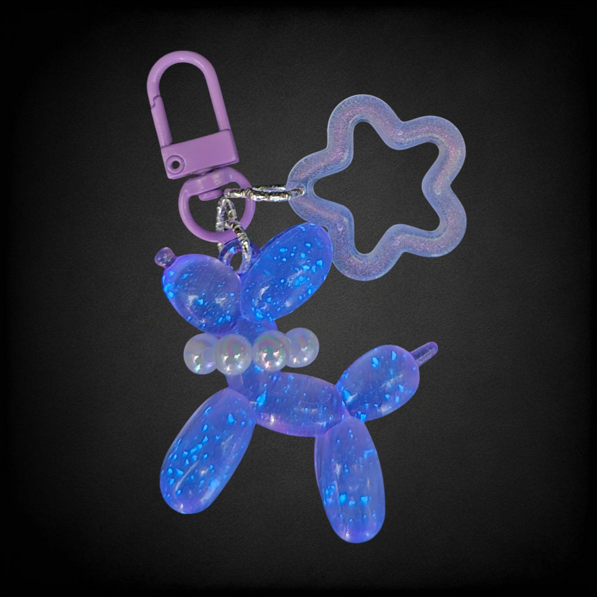 Purple Glow in the Dark Iridescent pearlescent balloon dog and star charm. 