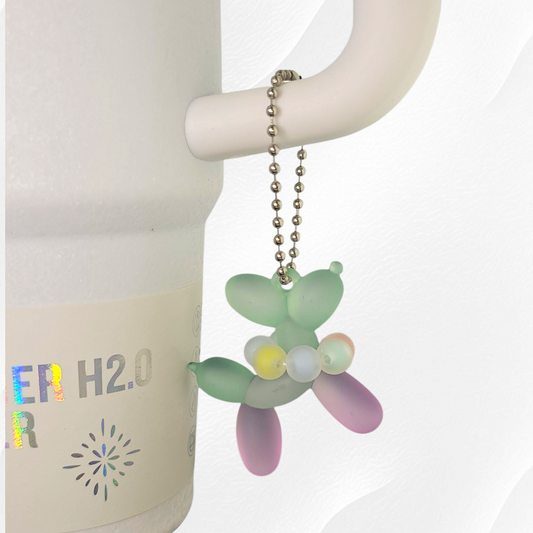 Purple & Green Ombre Balloon Dog wearing a beaded necklace tumbler charm. 