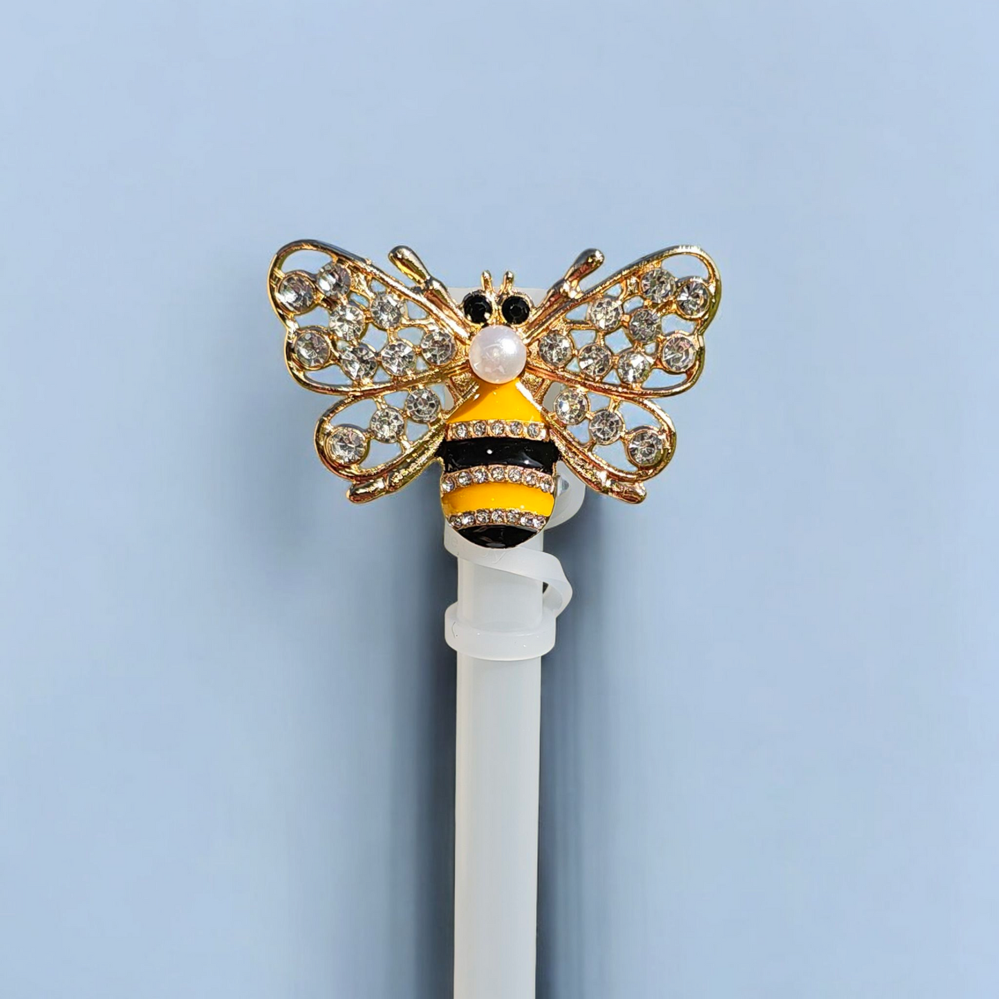 Diamond and Pearl encrusted black, yellow, and gold metal straw topper with Silicone Straw cap. 