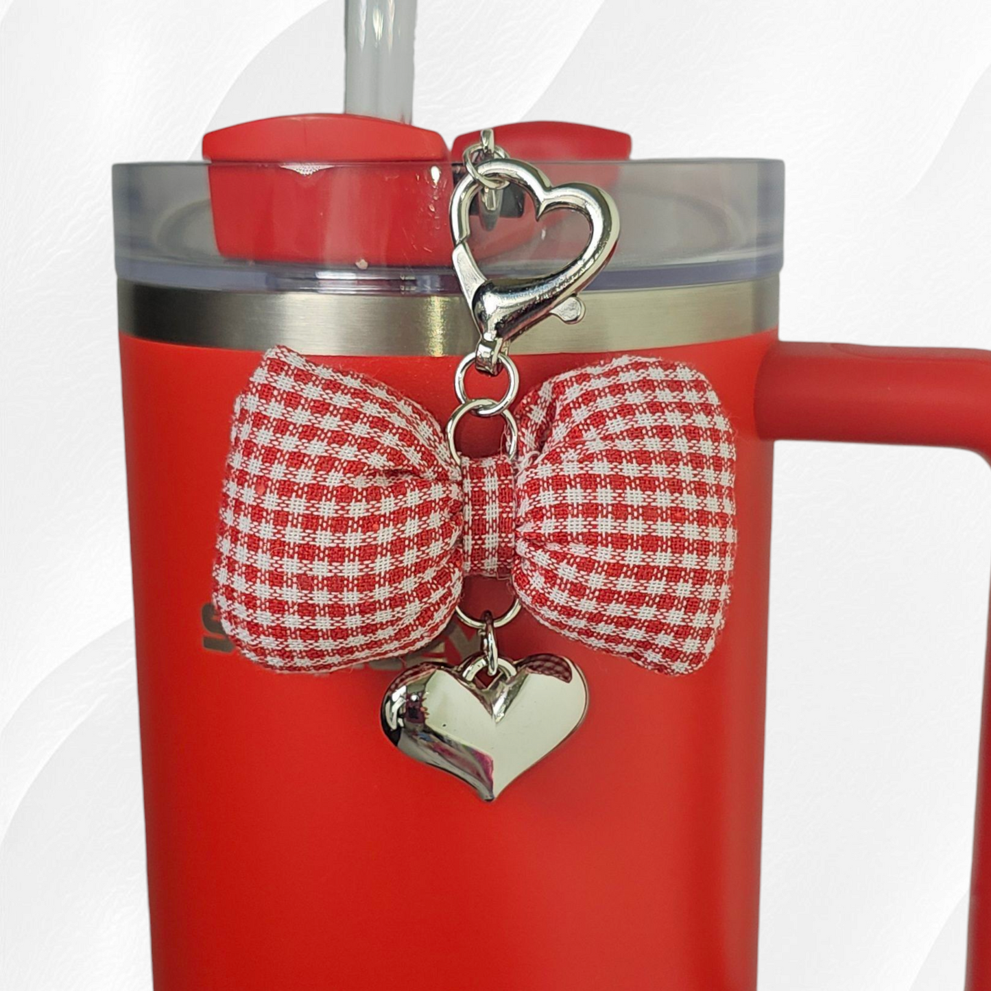 Red and White Gingham Bow with silver heart charm. 