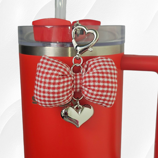 Red and White Gingham Bow with silver heart charm. 