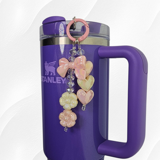 Pearlescent pink and white bow with daisies charm 