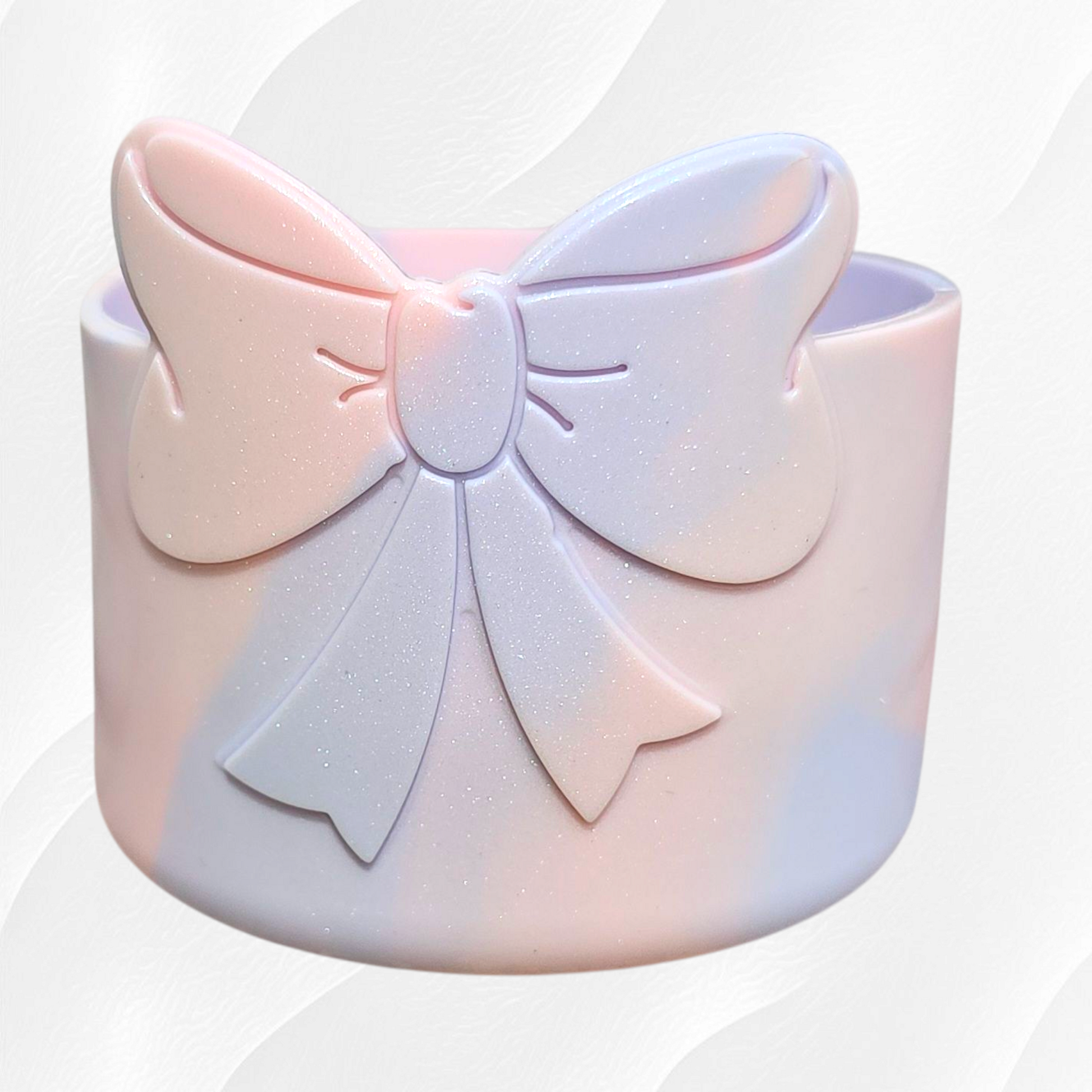Light peachy pink and periwinkle blue shimmery Bow Silicone Tumbler Boot. 
Cotton Candy Shimmer Tumbler Boot. 