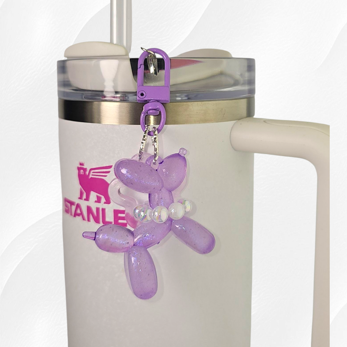 Purple Glow in the Dark Iridescent pearlescent balloon dog and star charm. 