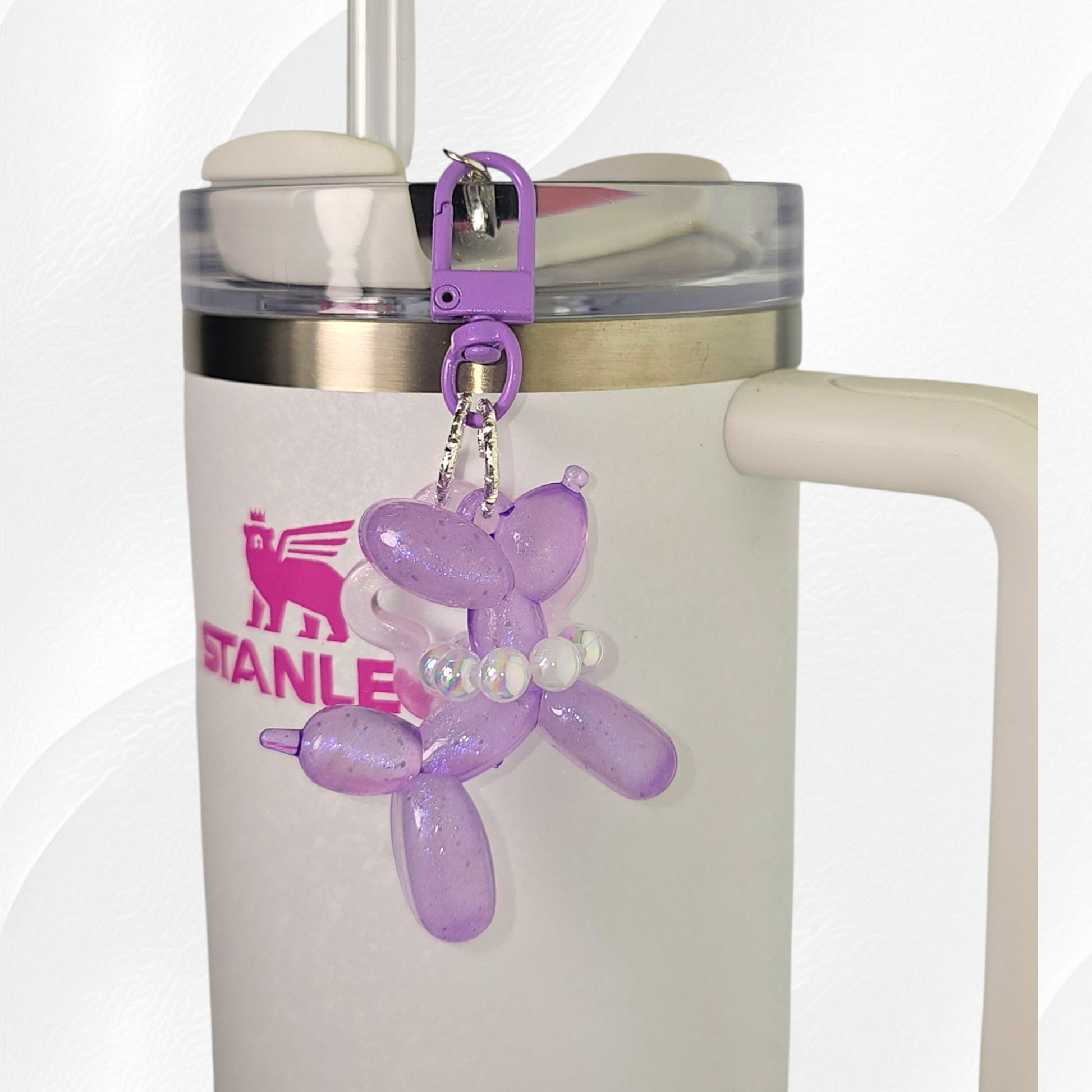 Purple Glow in the Dark Iridescent pearlescent balloon dog and star charm. 