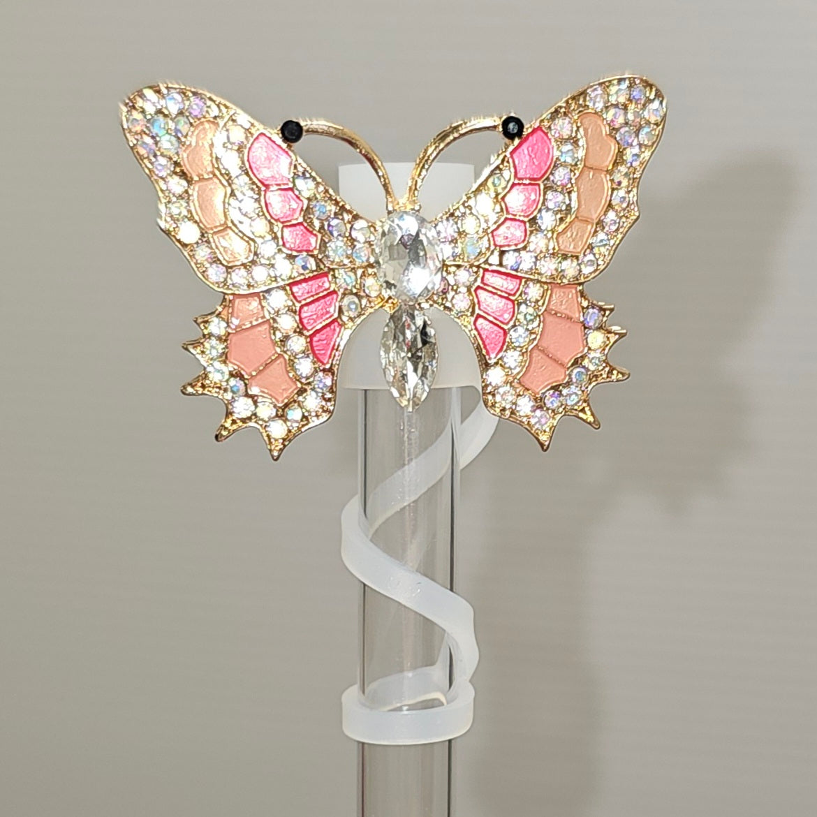 Luxury metal gold, coral Pink, Pink, and diamond butterfly straw topper - straw cover. Taken with camera flash. 