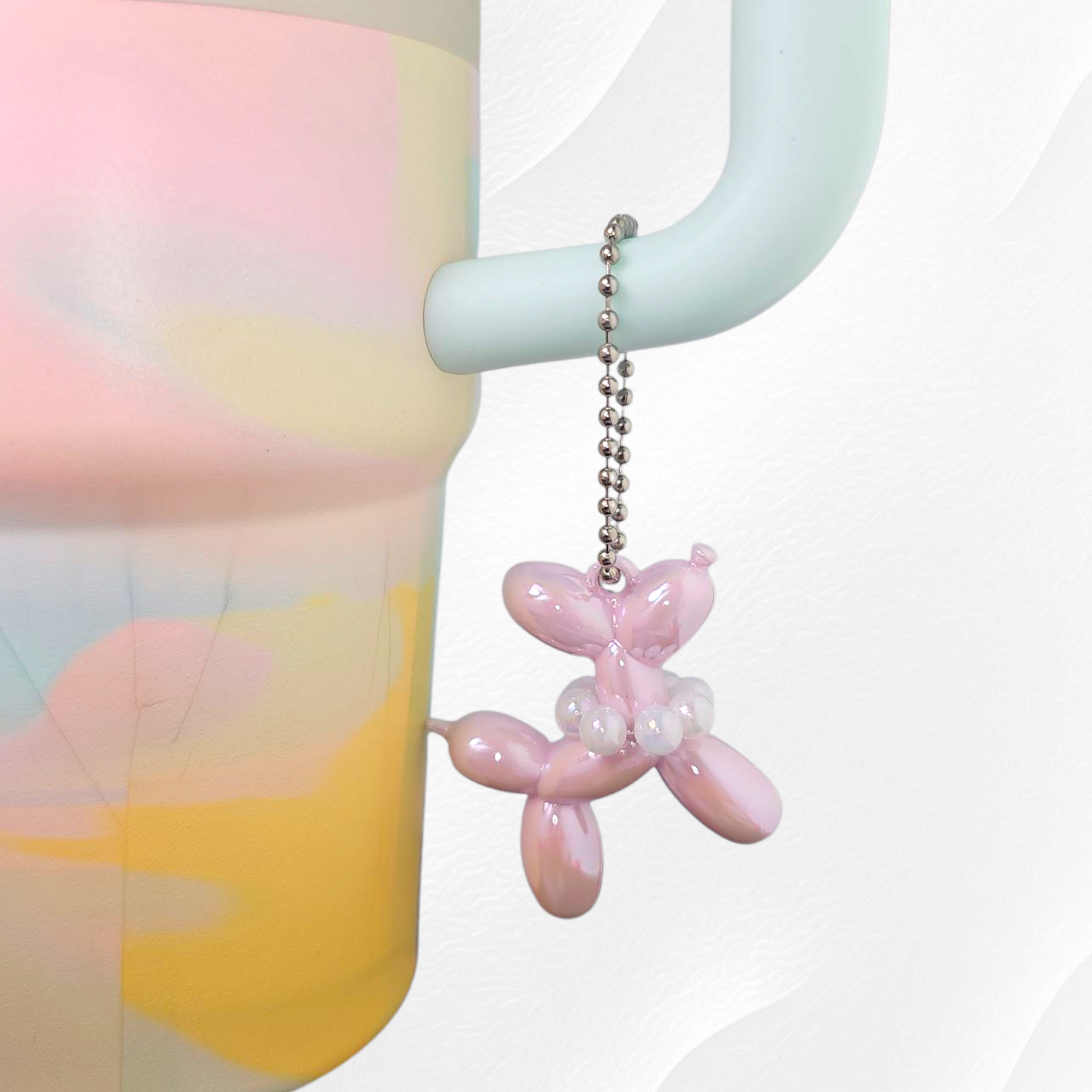 Aster is a ligh purple  / pink color. Balloon Dog tumbler charm. 