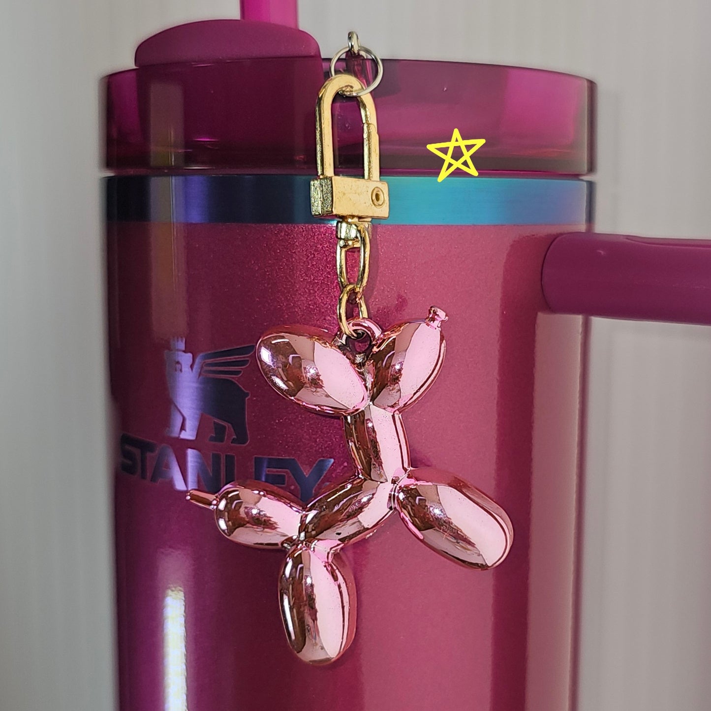 Primrose Pink Balloon Dog tumbler charm. Has flaws. 