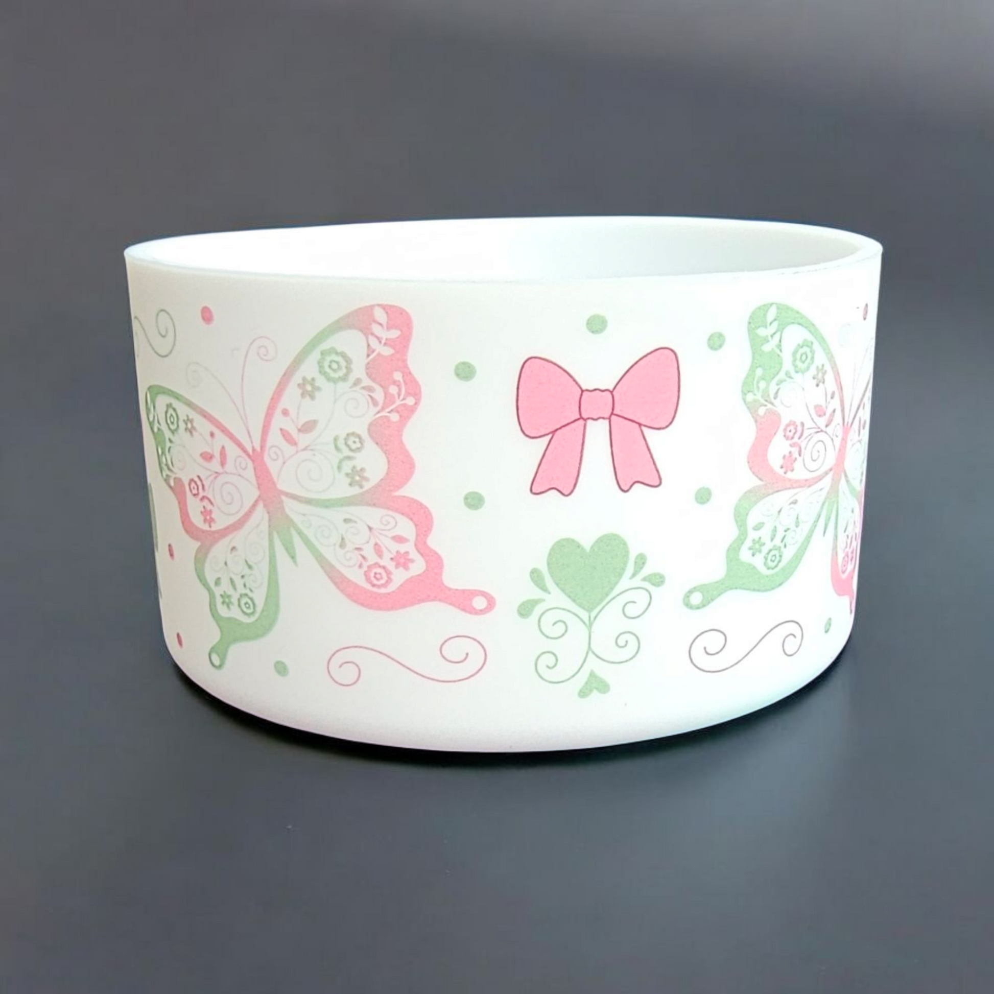 Pink and Green Butterflies, Coquette Bows, and Hearts on a White Silicone Tumbler Boot by Southern Creative Glamour 