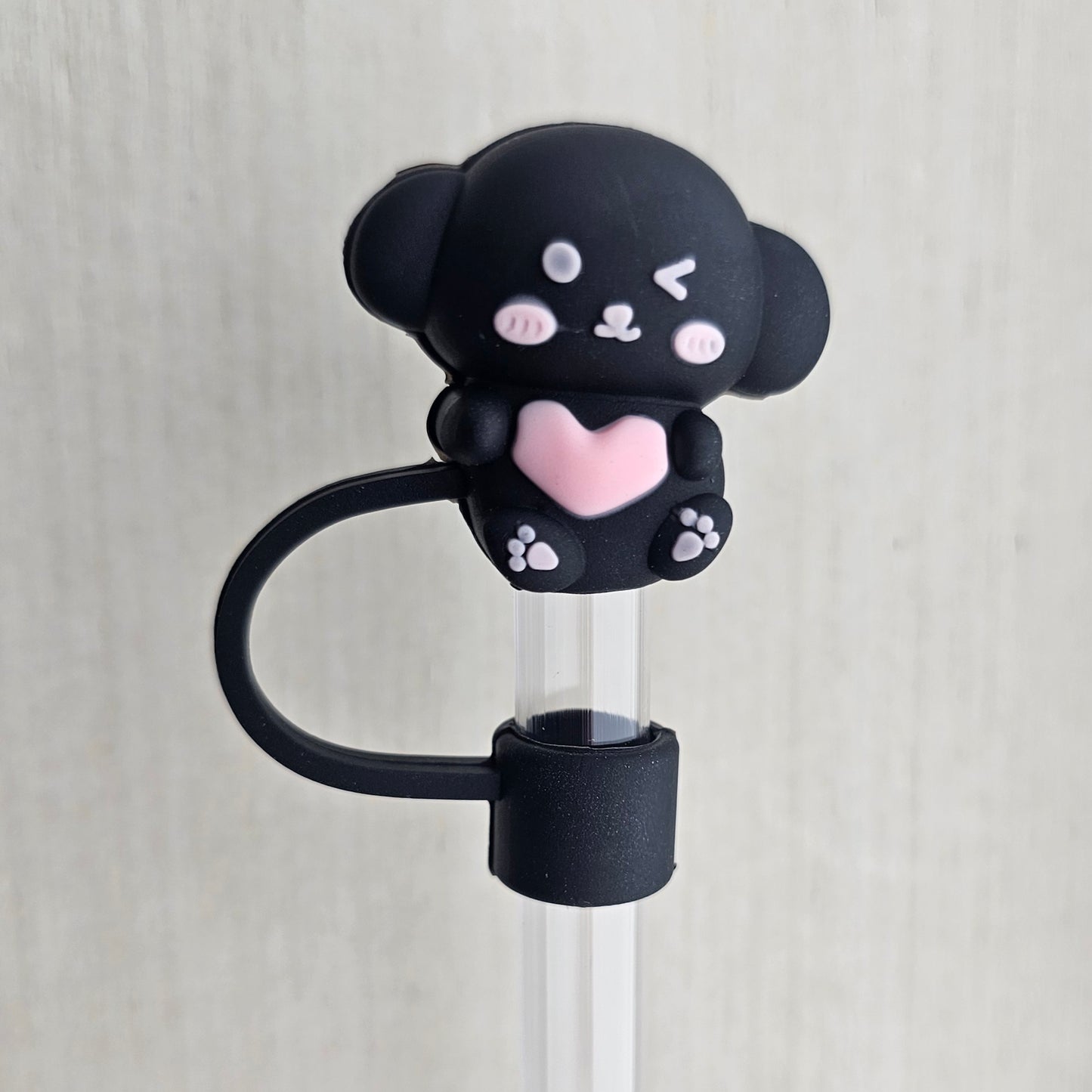 Black Koala Bear holding a light pink heart 3D Silicone Straw Topper  - Straw Cover. 