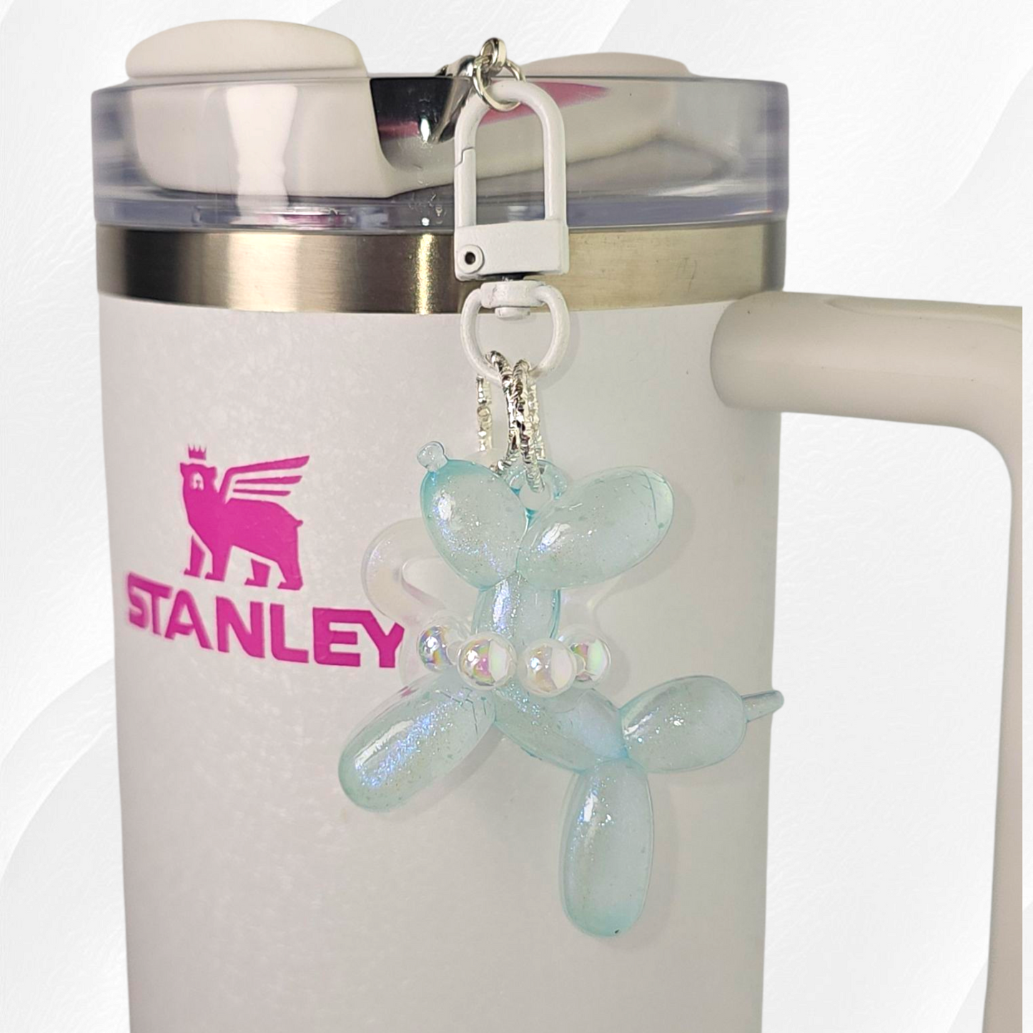 Blue Glow in the Dark Iridescent pearlescent balloon dog and star charm. 