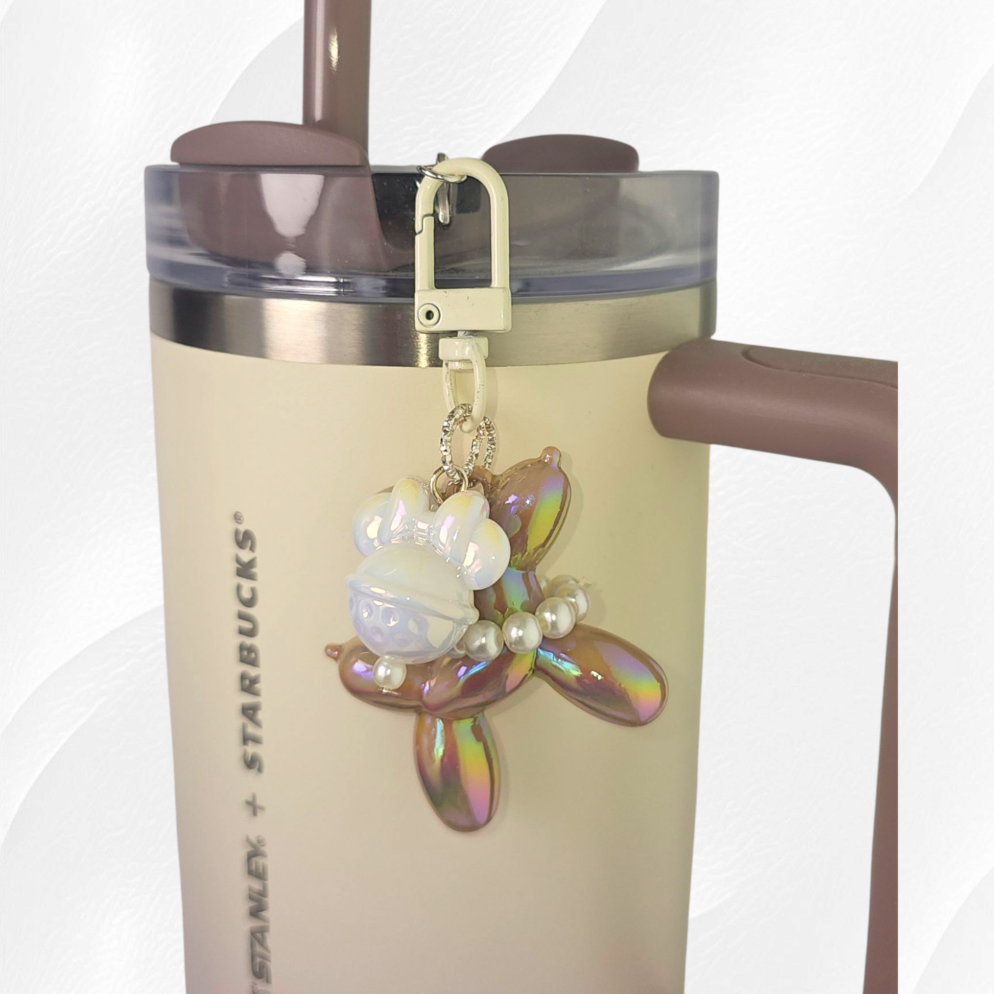 Brown Balloon Dog and bow tumbler charm. 