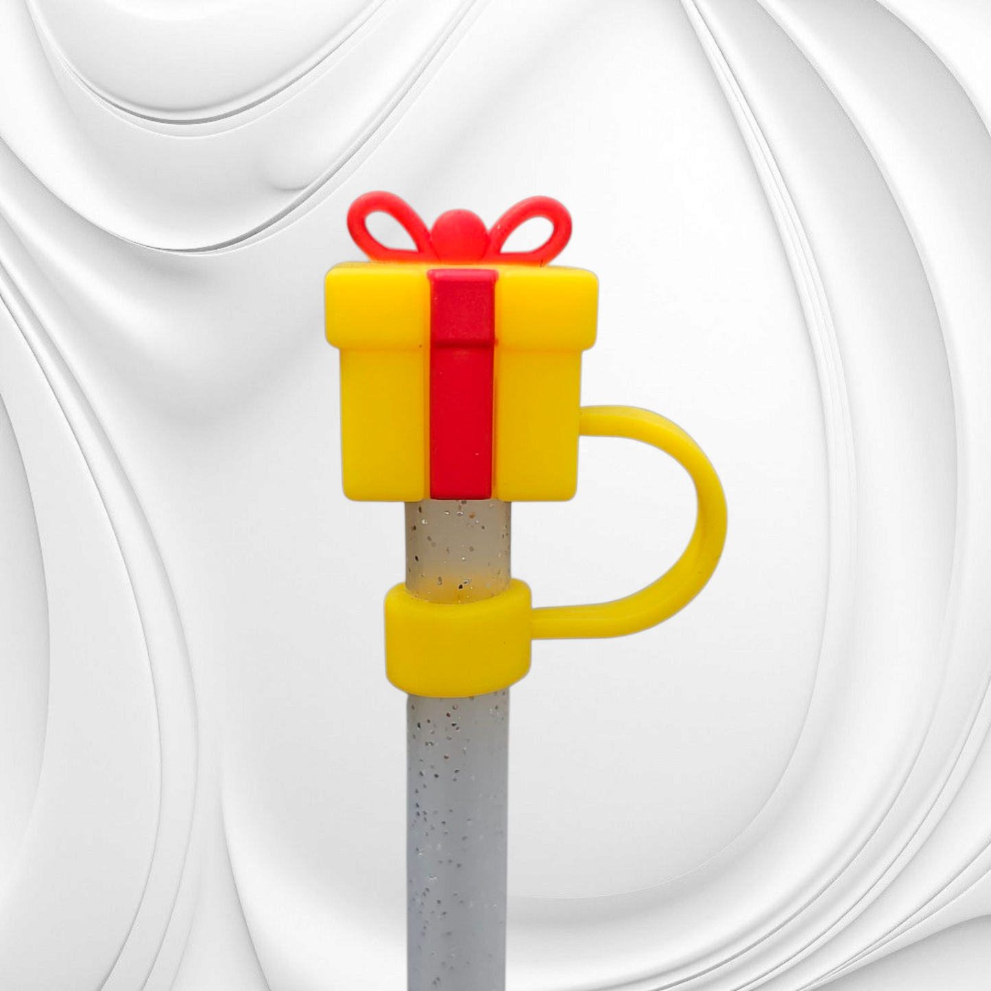 Yellow and red Christmas Present 3D Silicone Straw Topper. 