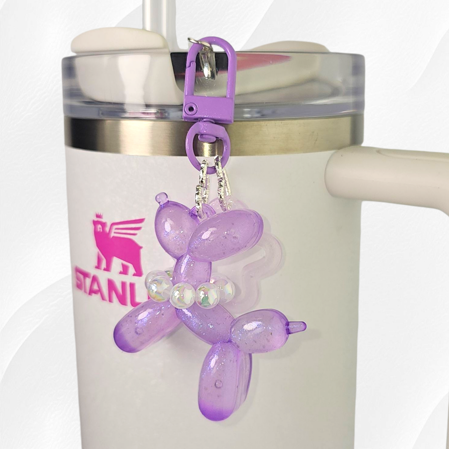 Purple Glow in the Dark Iridescent pearlescent balloon dog and star charm. 