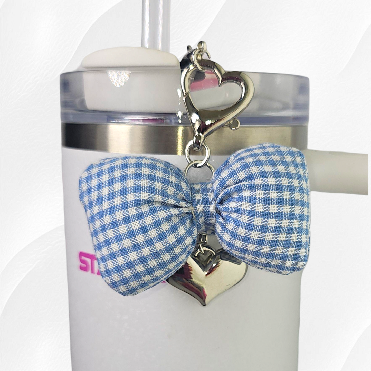 Blue and White Gingham Bow with silver heart charm. 