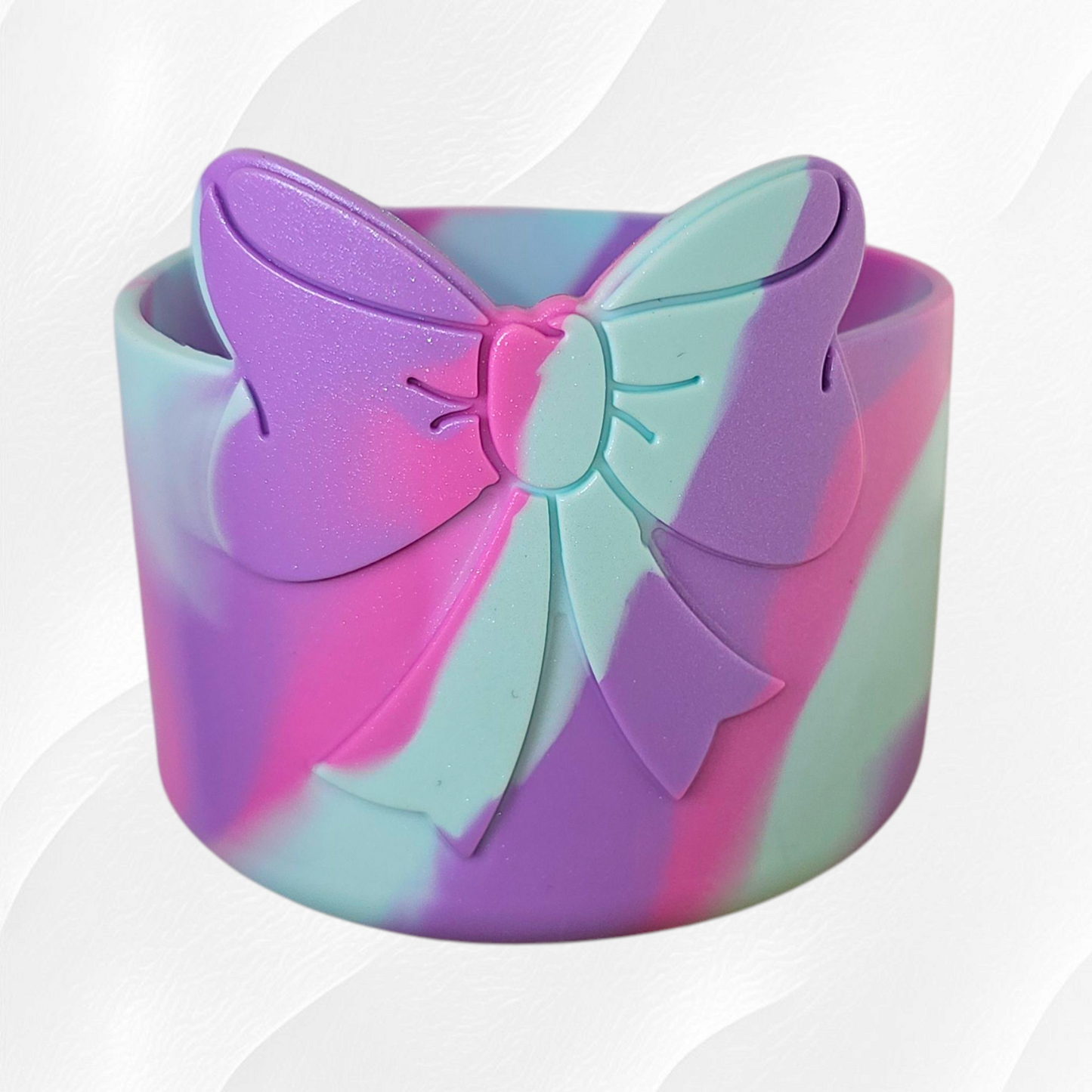 Pastel Swirl Shimmer is a Southern Creative Glamour Exclusive color with a mix of hot pink, mint, and purple in this gorgeous Coquette Bow Silicone Tumbler Boot. 