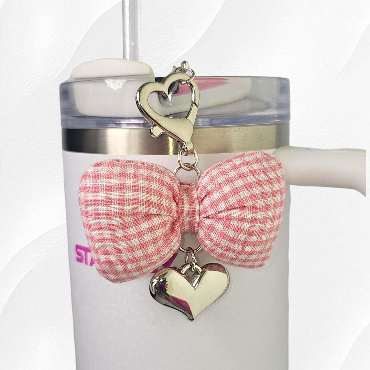 Pink and White Gingham Bow with silver heart charm. 