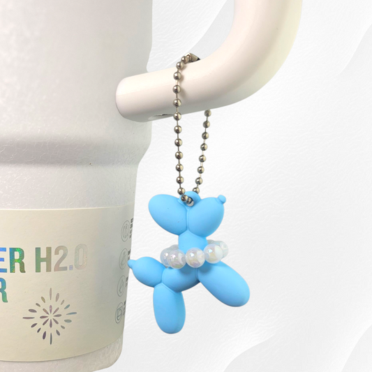 Blue Balloon Dog wearing white pearl necklace cup handle charm. 