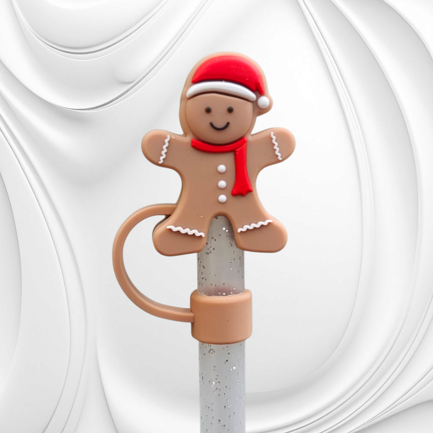 Brown Gingerbread Man wearing red Santa Hat 3D Silicone Straw Topper. 