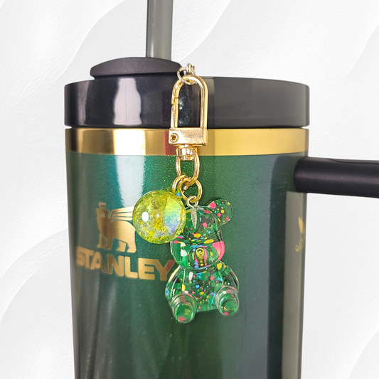 Transparent green teddy bear with green and yellow specks. Use as a tumbler, purse, or keychain charm. 