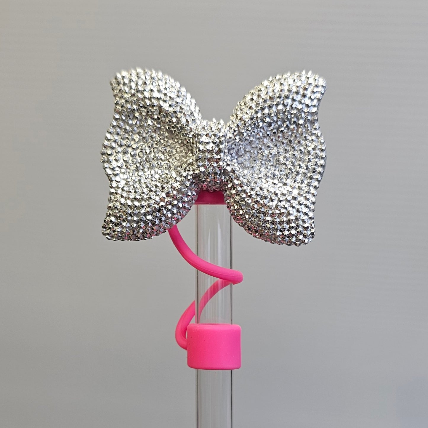 Silver Bow Tie Silicone Straw Topper with Hot Pink  / Barbie Pink Silicone Straw Topper base. 