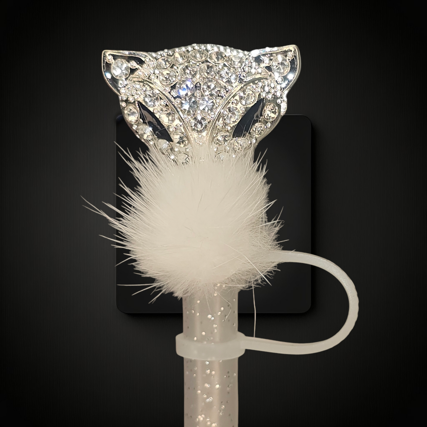 Luxury metal Diamond and Jewel encrusted Silver Mascarade Fox Straw Topper. White diamonds and white bo feathers adorn this beautiful metal straw topper. Taken with camera flash. 