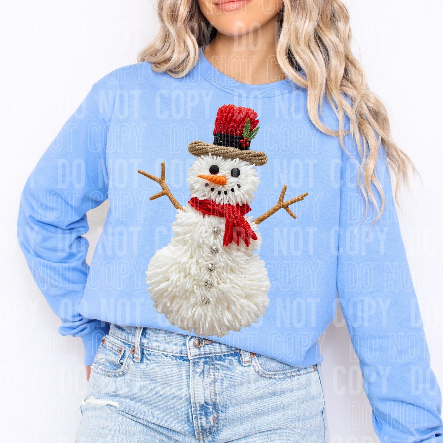 Snowman faux yarn design on gray Christmas t-shirt and sweatshirt with red scarf and top hat, cozy holiday graphic apparel.
